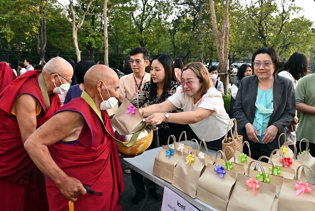 The Faculty of Engineering, Mahidol University participated in a merit-making ceremony, offering alms to monks and reciting Buddhist mantras to mark the onset of the new year in 2024.